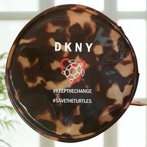 DKNY Keep the Change Save the Turtles tortoise shell print wristlet